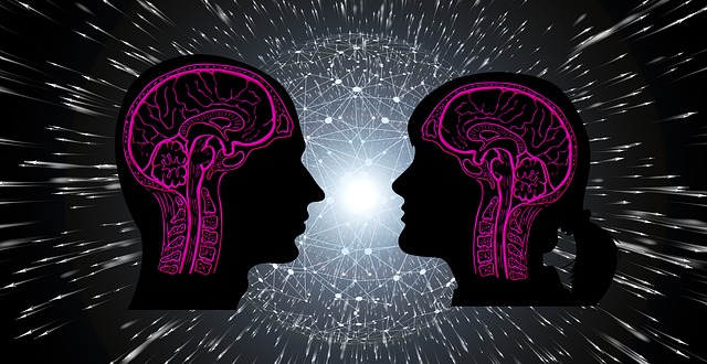 Image of two brains beaming with light to express of memory exercise